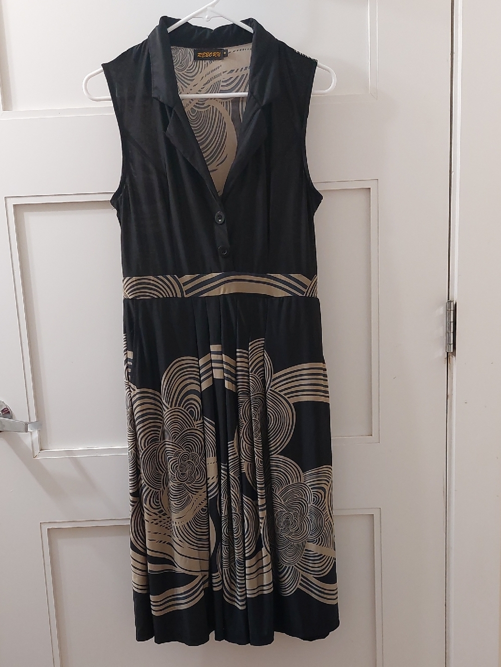 Reborn Black Dress with Beige Swirl Pattern
